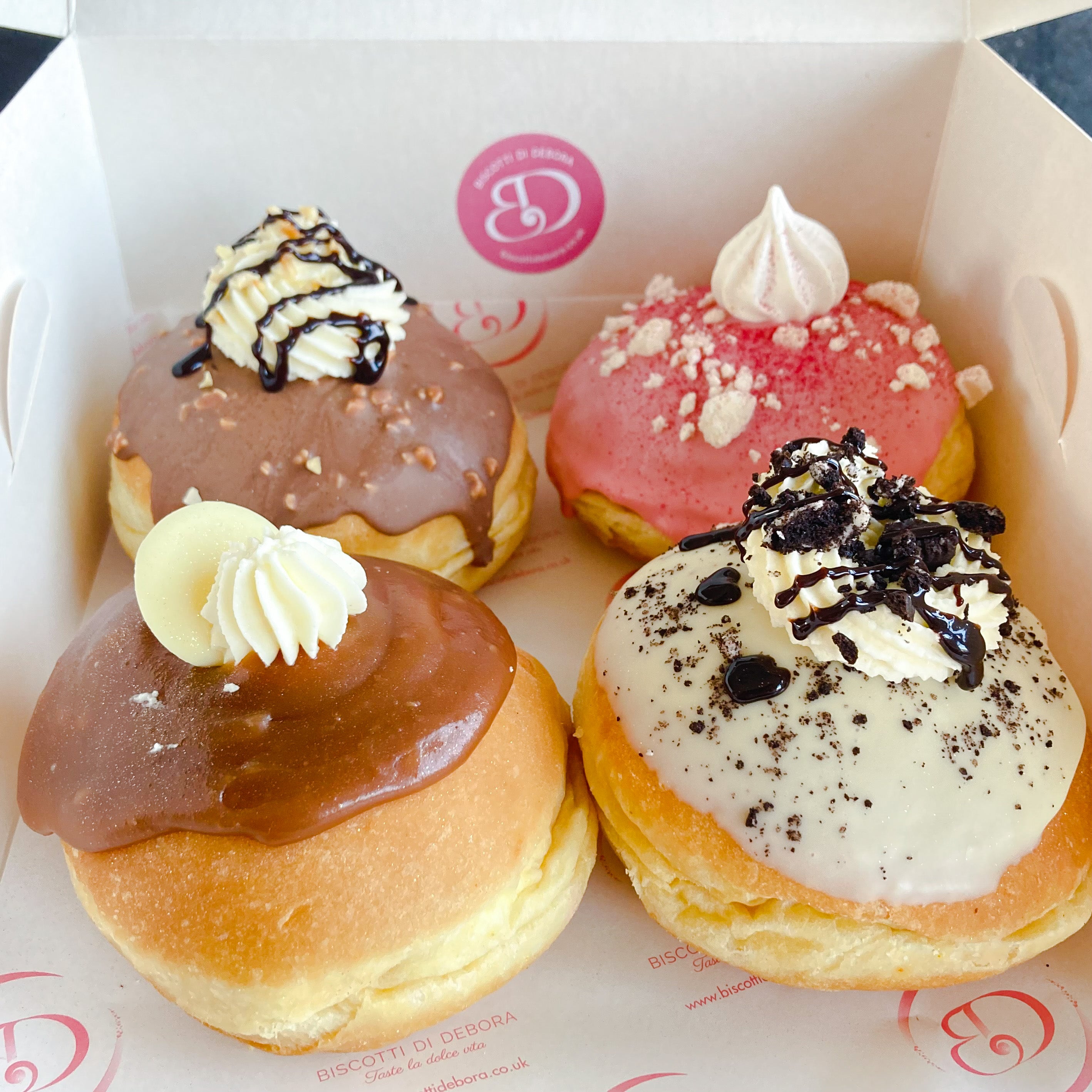 Close up of doughnuts in a box
