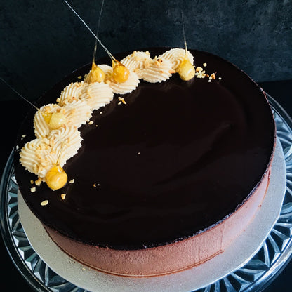 A Torta Setteveli chocolate cake with hazelnut mousse and chocolate sponge layers. Made by Italian bakery Biscotti di Debora of Cambridge.
