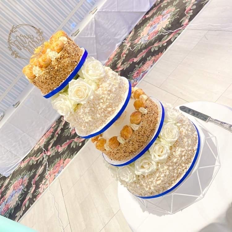 A Towering Wedding Cake with Profiteroles